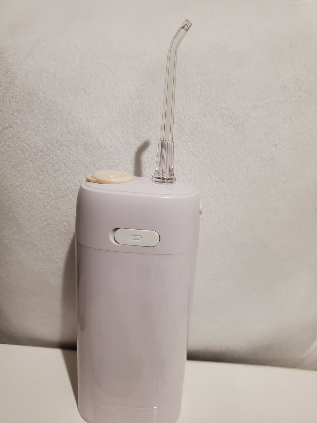 Portable dental water flosser 