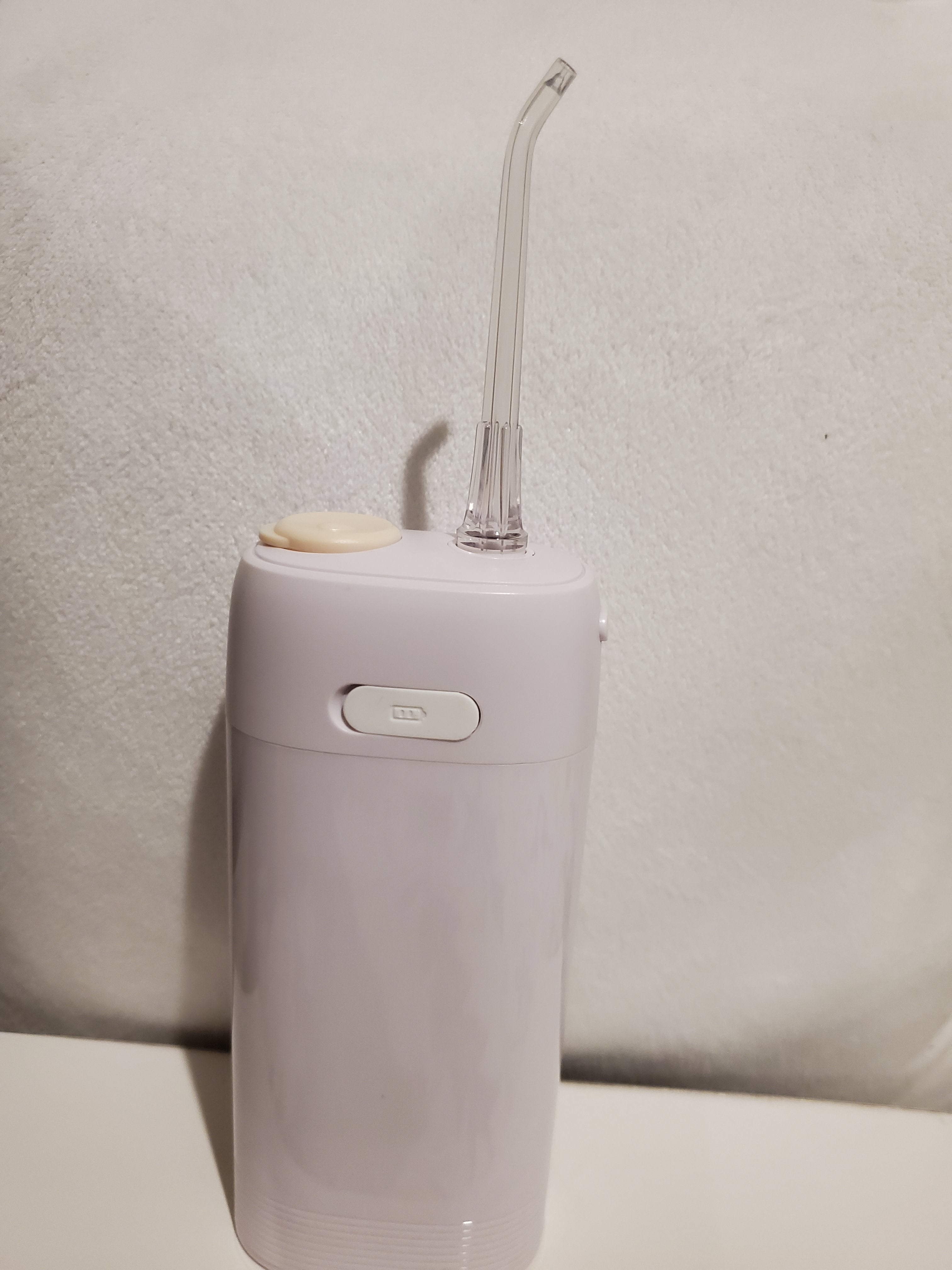 Portable dental water flosser 